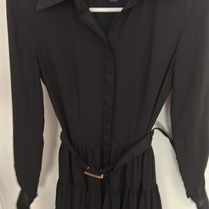 Used black long sleeves dress. Size 32 ,36